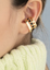 Earcuff Multicorazones Negro
